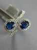 WIDE 1.23CT DIAMOND & AAA SAPPHIRE 18KT WHITE GOLD OVAL & ROUND CRISS CROSS RING