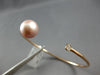 .06CT DIAMOND & AAA PINK SOUTH SEA PEARL 14KT ROSE GOLD FLEXIBLE BANGLE BRACELET