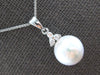 .08CT DIAMOND & SOUTH SEA PEARL 14KT WHITE GOLD FLOWER 3 STONE FLOATING PENDANT