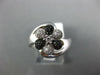 ESTATE .25CT WHITE & BLACK DIAMOND 14KT WHITE GOLD FLOWER CRISS CROSS FUN RING