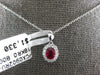 SMALL .62CT DIAMOND & AAA RUBY 18KT WHITE GOLD 3D ROUND & OVAL FLOWER PENDANT