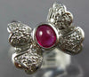 ESTATE .87CT DIAMOND & AAA RUBY PLATINUM 3D OVAL AND ROUND CLASSIC BOW RING