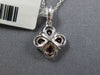 SMALL .74CT DIAMOND & AAA RUBY 18KT WHITE GOLD PEAR SHAPE 4 LEAF CLOVER PENDANT