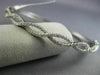 ESTATE WIDE 1.02CT DIAMOND 14K WHITE GOLD INFINITY SEMI ETERNITY BANGLE BRACELET