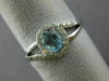 ESTATE .48CT DIAMOND & AAA OVAL CUT AQUAMARINE 14KT WHITE GOLD 3D LOVE KNOT RING