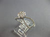 ESTATE LARGE .64CT DIAMOND 14KT WHITE GOLD FLOWER CRISS CROSS INFINITY LOVE RING