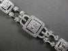EXTRA LARGE 3.67CT DIAMOND 18KT WHITE GOLD 3D ROUND & BAGUETTE TENNIS BRACELET