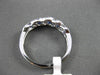ESTATE .65CT DIAMOND & AAA SAPPHIRE 18KT WHITE GOLD INFINITY ETOILE RING
