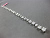 4.22CT DIAMOND 18KT WHITE GOLD ROUND BAGUETTE & MARQUISE SQUARE TENNIS BRACELET