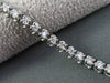 ESTATE 1.0CT DIAMOND 14KT WHITE GOLD FOUR PRONG 3D CLASSIC TENNIS BRACELET 3mm