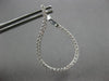 ESTATE LARGE 1.25CT DIAMOND 18KT WHITE GOLD TEAR DROP SIDEWAYS HANGING EARRINGS