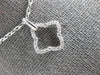ESTATE .19CT DIAMOND 18KT WHITE GOLD 3D OPEN 4 LEAF CLOVER FLOWER LOVE PENDANT