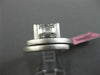 ESTATE WIDE 18KT WHITE GOLD FUN RING. 3D CLUSTER CRISS CROSS ETOILE DESIGN