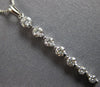 .65CT DIAMOND 18KT WHITE GOLD 3D ROUND SHARED PRONG JOURNEY BAR FLOATING PENDANT