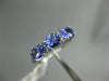 1.05CT DIAMOND & AAA TANZANITE 14KT WHITE GOLD 3D OVAL & ROUND ANNIVERSARY RING