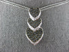 ESTATE .78CT WHITE & BLACK DIAMOND 14KT WHITE GOLD 3D HEART JOURNEY LOVE PENDANT