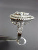 LARGE 18KT WHITE GOLD ENGAGEMENT RING. 3D CLUSTER PEAR SHAPE DOUBLE HALO DESIGN