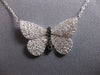 ESTATE LARGE .52CT WHITE & BLACK DIAMOND 14KT WHITE GOLD BUTTERFLY LOVE NECKLACE
