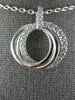 ESTATE .55CT DIAMOND 18KT WHITE GOLD CIRCLE OF LIFE INTERTWINING TRINITY PENDANT