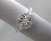 ESTATE .82CT ROUND DIAMOND 18KT WHITE GOLD 3D 4 STONE FLOWER HALO PROMISE RING