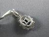 1.12CT DIAMOND & AAA SAPPHIRE 18KT WHITE GOLD 3D OVAL FLOWER FLOATING PENDANT