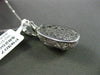 ESTATE .57CT DIAMOND & RUBY 14KT WHITE GOLD FILIGREE MILGRAIN BABY SHOE PENDANT
