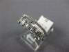 WIDE .45CT DIAMOND 14KT WHITE GOLD 3D ROUND & BAGUETTE CLUSTER ANNIVERSARY RING