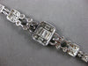 EXTRA LARGE 6.48CT DIAMOND 18KT WHITE GOLD ROUND BAGUETTE & MARQUISE 3D BRACELET