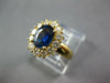 1.97CT DIAMOND & SAPPHIRE 18KT YELLOW GOLD OVAL & ROUND FLOWER ENGAGEMENT RING