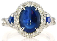 .90CT DIAMOND & AAA CABOCHON SAPPHIRE 18KT WHITE GOLD OVAL & ROUND INFINITY RING