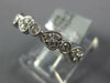 ESTATE .59CT DIAMOND 18KT WHITE GOLD 3D HEART SHAPE ETERNITY ANNIVERSARY RING