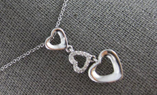 .06CT DIAMOND 14KT WHITE GOLD 3D OPEN HEART JOURNEY PAST PRESENT FUTURE PENDANT