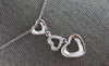 .06CT DIAMOND 14KT WHITE GOLD 3D OPEN HEART JOURNEY PAST PRESENT FUTURE PENDANT