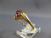 .77CT DIAMOND & AAA RUBY 14KT YELLOW GOLD MARQUISE & ROUND 3 STONE DIAGONAL RING