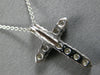 ESTATE .64CT DIAMOND 14KT WHITE GOLD SHARED PRONG INVISIBLE CROSS PENDANT #27677