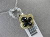 ESTATE .23CT DIAMOND & ONYX 14KT TWO TONE GOLD 3D DOUBLE FLOWER FLOATING PENDANT