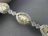ESTATE LONG 6.23CT WHITE & FANCY YELLOW DIAMOND 18KT WHITE GOLD TENNIS BRACELET