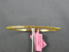 .67CT INTENSE FANCY YELLOW DIAMOND 18KT YELLOW GOLD 2MM ETERNITY BANGLE BRACELET
