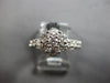 ESTATE .45CT DIAMOND 18KT WHITE GOLD 3D CLASSIC FLOWER LOVE RING