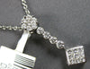 .50CT DIAMOND 14KT WHITE GOLD 3D ROUND & PRINCESS FLOWER LARIAT FLOATING PENDANT