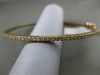 ESTATE .50CT DIAMOND 14KT ROSE GOLD 3D 2mm CLASSIC SHARE PRONG BANGLE BRACELET