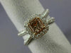ESTATE 1.24CT WHITE & BROWNISH ORANGE DIAMOND 18KT WHITE & ROSE GOLD LOVE RING