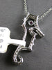 ESTATE .33CT DIAMOND & AAA RUBY 14KT WHITE GOLD HAPPY SEAHORSE FLOATING PENDANT