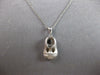 ESTATE .12CT DIAMOND 14K WHITE GOLD MATTE & SHINY BABYGIRL SHOE FLOATING PENDANT