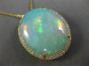 ESTATE EXTRA LARGE 14.04CT DIAMOND & AAA OPAL 14KT YELLOW GOLD OVAL HALO PENDANT
