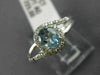 ESTATE .48CT DIAMOND & AAA OVAL CUT AQUAMARINE 14KT WHITE GOLD 3D LOVE KNOT RING