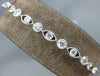ESTATE 2.83CT DIAMOND 18KT WHITE GOLD 3D ROUND & MARQUISE ETOILE TENNIS BRACELET