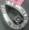 ESTATE 1.10CT DIAMOND 18KT WHITE GOLD ROUND & BAGUETTE HORSE SHOE LUCKY PENDANT