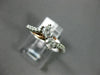 ESTATE .65CT DIAMOND 14KT WHITE & ROSE GOLD 3D TWO STONE SIDE BY SIDE LOVE RING