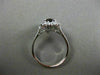 ESTATE 1.45CT DIAMOND & NATURAL GARNET 18KT WHITE GOLD OVAL HALO ENGAGEMENT RING